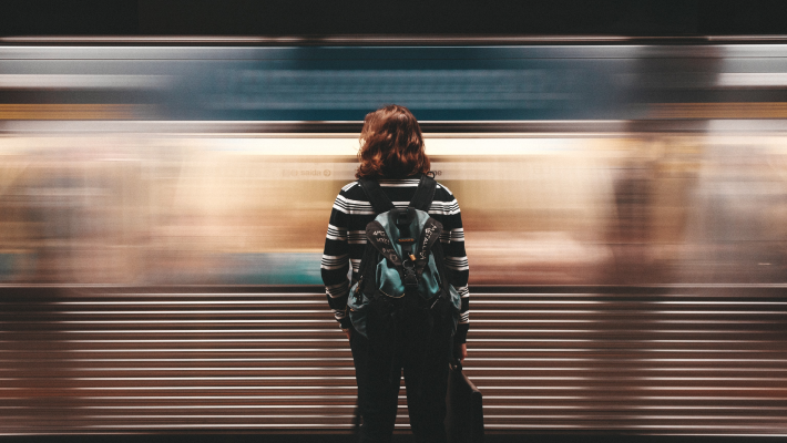 Woman watching train