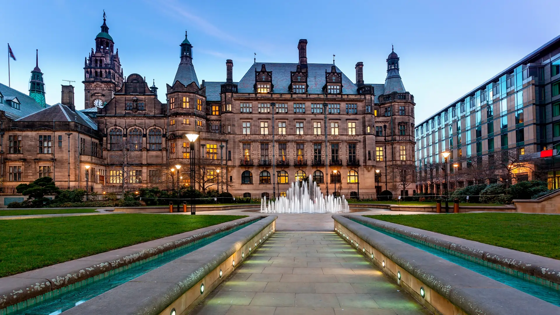 Sheffield Town Hall in dusk with fountain