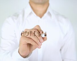 Autism being written on glass