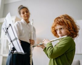 Child learning flute