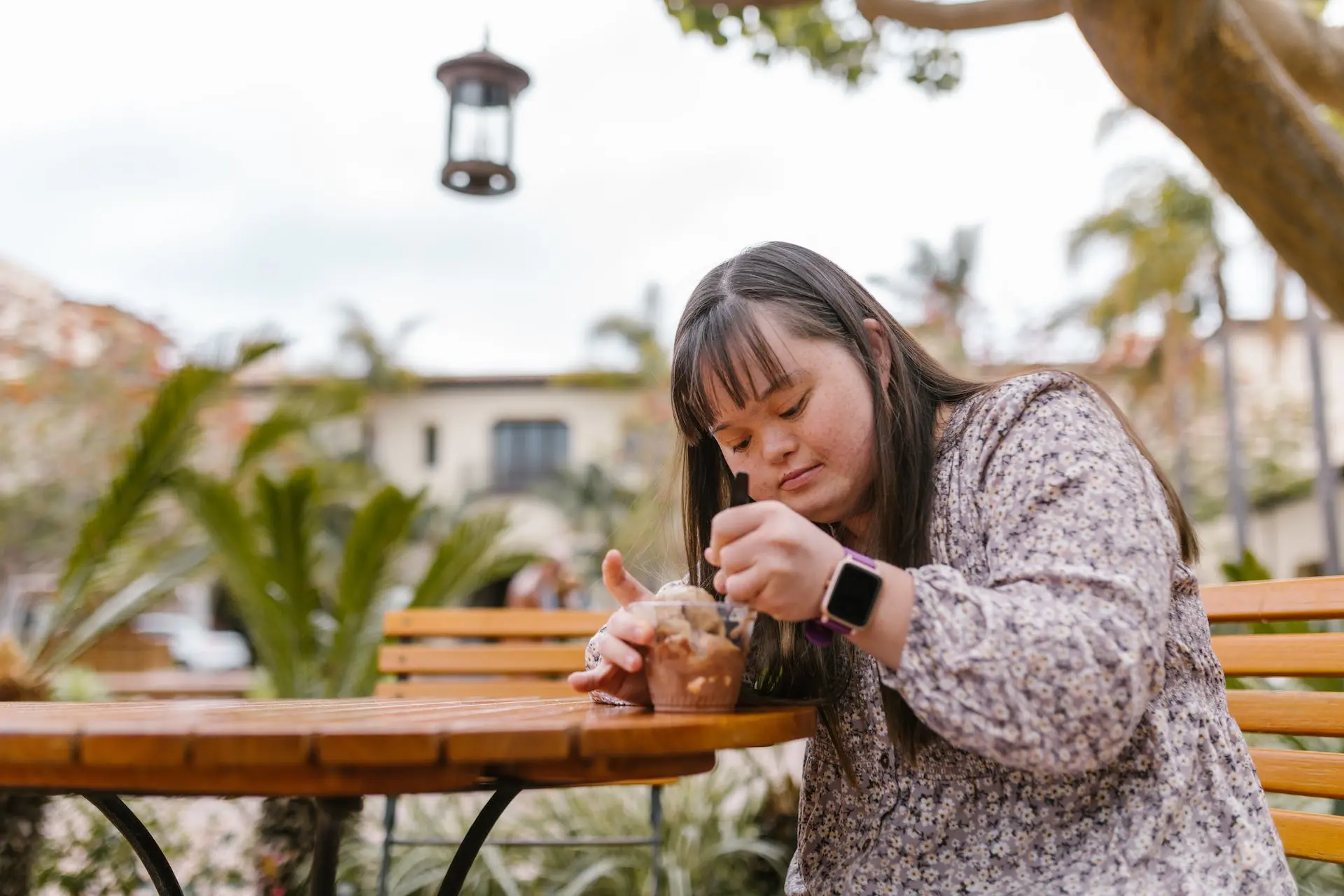 Woman outside eating icecream